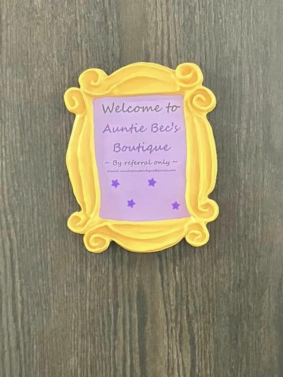 Welcome sign on the door to AuntieBec's